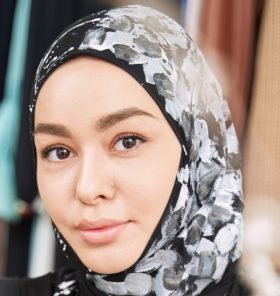 smiling young woman making sketches of islamic fas 2022 03 25 18 55 43 utc cropped.jpg